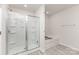 Bathroom featuring a glass-enclosed shower and separate bathtub, creating a luxurious bathing experience at 3309 Colorado Blue Ct, Gastonia, NC 28056
