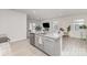 Open-concept kitchen with granite countertops, stainless steel appliances, and view to the living and dining areas at 3309 Colorado Blue Ct, Gastonia, NC 28056