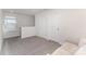 Bright loft area with neutral carpet, white walls, and natural light, offering a flexible space at 3309 Colorado Blue Ct, Gastonia, NC 28056