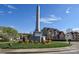 Howard Circle monument surrounded by vibrant landscaping, offering a welcoming neighborhood entrance at 3913 Sages Ave, Indian Trail, NC 28079