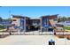 Modern stadium entrance with stone accents, gated access, and landscaped surroundings for a welcoming arrival at 4102 Harmony Hills Dr, Matthews, NC 28104