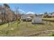 Fenced backyard featuring a storage shed, gazebo, and playset at 4285 Dc Dr, Concord, NC 28025