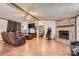 Inviting living room features a stone fireplace, wood trim, and comfortable seating at 4285 Dc Dr, Concord, NC 28025