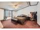 Spacious main bedroom with a large window, plush carpet, and ample closet space at 4285 Dc Dr, Concord, NC 28025
