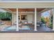 Outdoor cabana featuring a covered patio, seating area, and convenient access to amenities at 4510 Old Course Dr, Charlotte, NC 28277