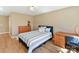 Inviting bedroom featuring hardwood floors, modern furniture, and ample natural light at 4634 Craigmoss Ln, Charlotte, NC 28278