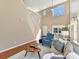 Bright living room with high ceilings, large windows, and hardwood floors at 4634 Craigmoss Ln, Charlotte, NC 28278