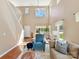 Bright living room with high ceilings, large windows, and hardwood floors at 4634 Craigmoss Ln, Charlotte, NC 28278