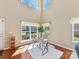 Bright and airy home office featuring hardwood floors and lots of natural light at 4634 Craigmoss Ln, Charlotte, NC 28278