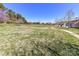 Expansive green space with a walking path offers a serene outdoor setting for recreation and relaxation at 4634 Craigmoss Ln, Charlotte, NC 28278