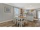 Open concept kitchen with modern appliances, granite countertops, and an island with seating at 4790 Polk Ford Rd, Stanfield, NC 28163