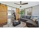 Bright living room with barn doors, natural light, and stylish decor at 4790 Polk Ford Rd, Stanfield, NC 28163
