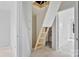 Picture showing attic access via a pull down wooden ladder at 513 Harrel St, Salisbury, NC 28144