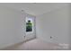 Bare bedroom with one window allowing natural light to illuminate the room at 513 Harrel St, Salisbury, NC 28144