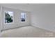 Spacious bedroom with two large windows providing lots of natural light at 513 Harrel St, Salisbury, NC 28144
