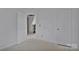 Bright bedroom boasts white doors and trim and pull-down attic access at 513 Harrel St, Salisbury, NC 28144