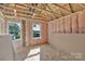 Interior view of a room under construction, showing insulation and framing at 513 Harrel St, Salisbury, NC 28144
