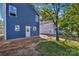 Side view of a charming blue two-story home with double-hung windows at 513 Harrel St, Salisbury, NC 28144