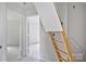 Hallway view with ladder leading up to the attic at 513 Harrel St, Salisbury, NC 28144