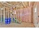 Spacious interior view, displaying exposed framing that highlights the home's construction and potential at 513 Harrel St, Salisbury, NC 28144