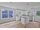 New kitchen featuring granite countertops, white cabinets, and a kitchen island at 513 Harrel St, Salisbury, NC 28144