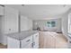 Bright open-concept living space with an island, fresh white walls, and natural light at 513 Harrel St, Salisbury, NC 28144