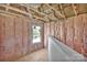 Interior of a room showing insulation and wood framing at 513 Harrel St, Salisbury, NC 28144