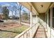 Home featuring porch with railing and outdoor view at 7500 Soaringfree Ln, Charlotte, NC 28226