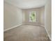 Bedroom featuring natural light from a window and neutral wall paint at 8008 Battersea Ct, Waxhaw, NC 28173