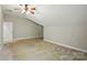 Bedroom with neutral walls, carpet, ceiling fan and a door to storage at 8008 Battersea Ct, Waxhaw, NC 28173
