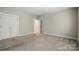 Bedroom featuring a double door closet and attached bathroom entrance at 8008 Battersea Ct, Waxhaw, NC 28173