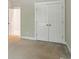 Bedroom features a closet and an additional entrance at 8008 Battersea Ct, Waxhaw, NC 28173
