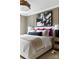 Cozy main bedroom with a stylish bed, accent pillows, and modern bedside lighting at 8021 Lerwick Trl, Charlotte, NC 28269