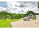 Well-maintained backyard with a hot tub and storage shed offering a relaxing and practical outdoor space at 10071 Highland Creek Cir, Indian Land, SC 29707