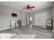 This bedroom features wood-look flooring, recessed lighting, and ample space at 10071 Highland Creek Cir, Indian Land, SC 29707