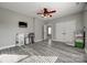 Spacious bedroom with gray walls, ceiling fan and view of closet at 10071 Highland Creek Cir, Indian Land, SC 29707