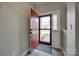 View of the foyer and front door showcasing light gray walls and a view to the exterior at 10071 Highland Creek Cir, Indian Land, SC 29707