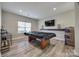 Game room or den features recessed lights, pool table, and light grey wood-look floors at 10071 Highland Creek Cir, Indian Land, SC 29707