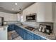 Modern kitchen featuring stainless steel appliances, granite countertops, and two-tone cabinets at 10071 Highland Creek Cir, Indian Land, SC 29707