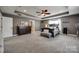 Spacious main bedroom features tray ceiling, ceiling fan, and furniture at 10071 Highland Creek Cir, Indian Land, SC 29707