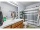 Bathroom featuring a vanity and a shower with a striped curtain at 102 Brandywine Ne Dr # R3, Conover, NC 28613