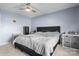 A spacious bedroom with large bed and gray storage boxes at 102 Brandywine Ne Dr # R3, Conover, NC 28613