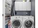 Laundry room featuring a side-by-side washer and dryer with overhead cabinets for storage at 102 Brandywine Ne Dr # R3, Conover, NC 28613