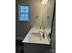 Bathroom featuring double sinks, large mirror, and modern fixtures at 103 High Rock Ct # 11, Statesville, NC 28677