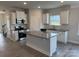 Stylish kitchen with stainless steel appliances, granite countertops, and a functional center island at 103 High Rock Ct # 11, Statesville, NC 28677