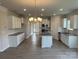 Beautiful kitchen with gray countertops, white cabinetry, and stainless steel appliances at 103 High Rock Ct # 11, Statesville, NC 28677