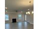 Bright living room featuring modern floors, a cozy fireplace, and ample natural light at 103 High Rock Ct # 11, Statesville, NC 28677