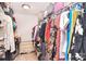 Walk-in closet featuring built-in shelving and ample hanging space for clothing at 1100 Millbank Dr, Matthews, NC 28104