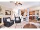 Open-concept living room with wood-look floors and a view of the kitchen at 1100 Millbank Dr, Matthews, NC 28104