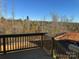 New wood back deck overlooking a natural, wooded area at 117 High Rock Ct # 9, Statesville, NC 28677